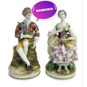 Figura feminina e masculina em porcelana