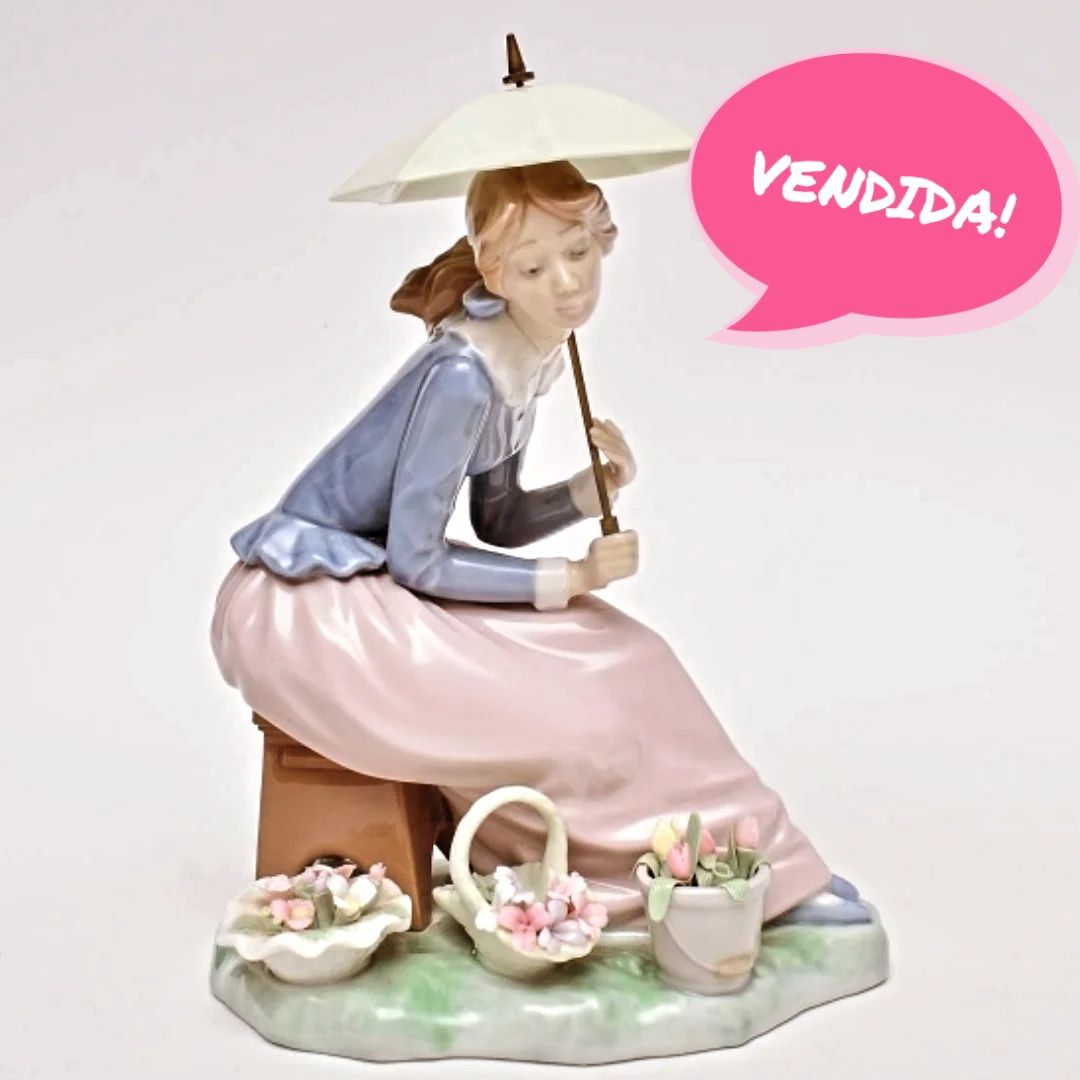 Florista com sombrinha Lladró